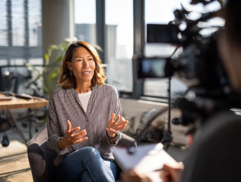 A founder being interviewed on camera